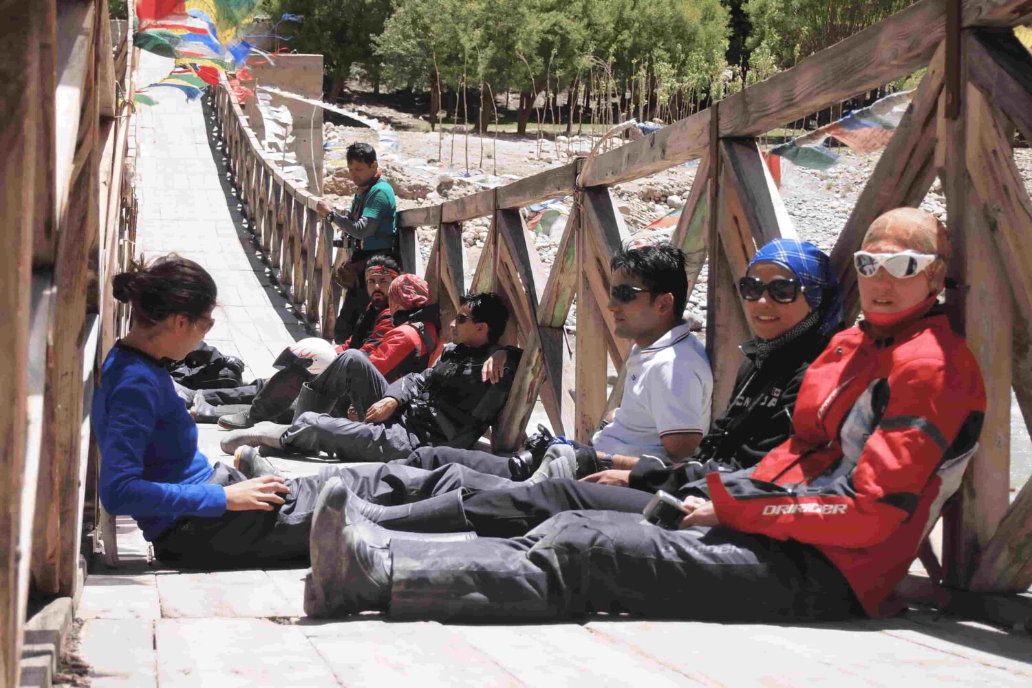 riders-wooden-bridge-nepal-to-tibet-motorcycle-tour.jpg