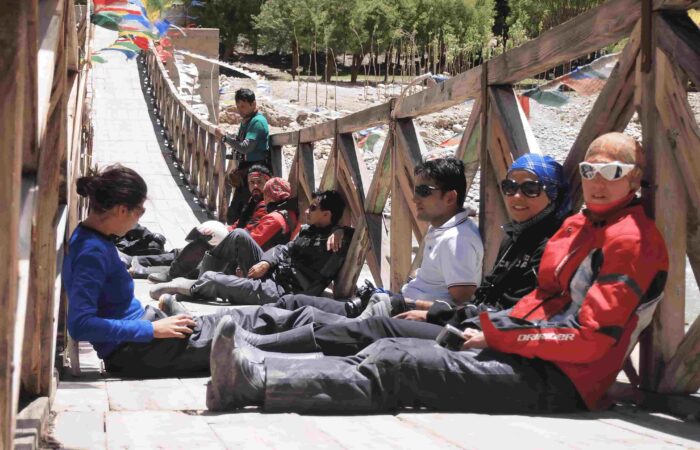 riders-wooden-bridge-nepal-to-tibet-motorcycle-tour.jpg