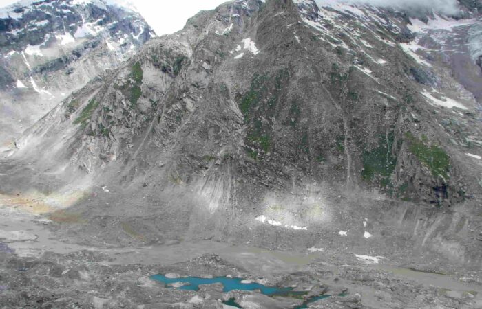 Glacial lakes and rugged Himalayan terrain along the Pin Parvati Pass Trek in India.