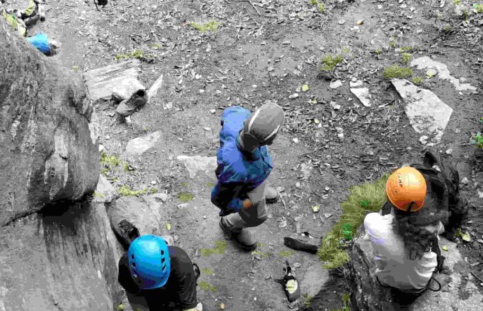 Rock climbing belay setup and safety training in Sethan near Manali, Indian Himalayas
